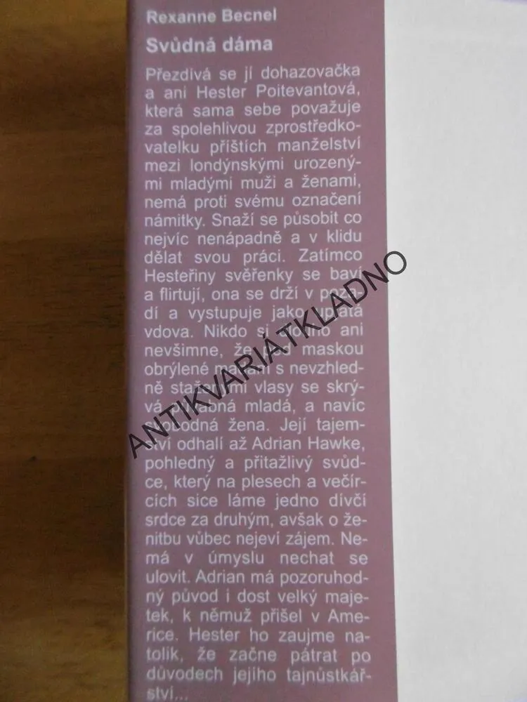 SVŮDNÁ DÁMA, REXANNE BECNEL, **an
