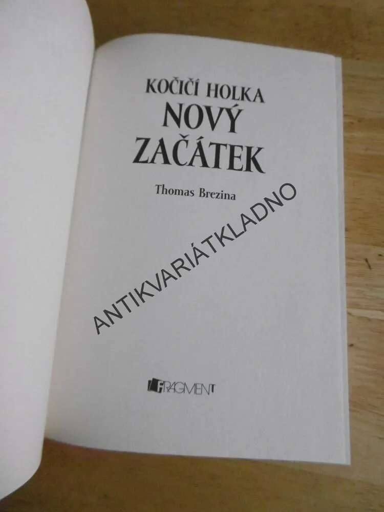 KOČIČÍ HOLKA, NOVÝ ZAČÁTEK, THOMAS BREZINA, **an