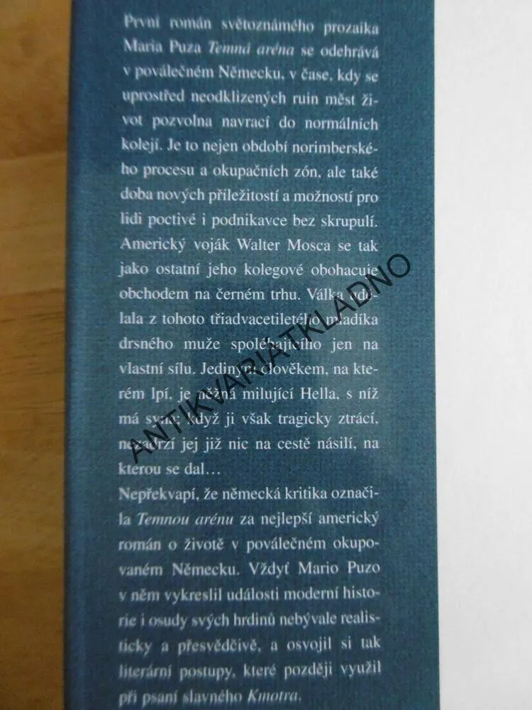 TEMNÁ ARÉNA, MARIO PUZO, **an