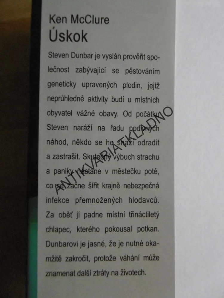 ÚSKOK, KEN MCCLUR, **an