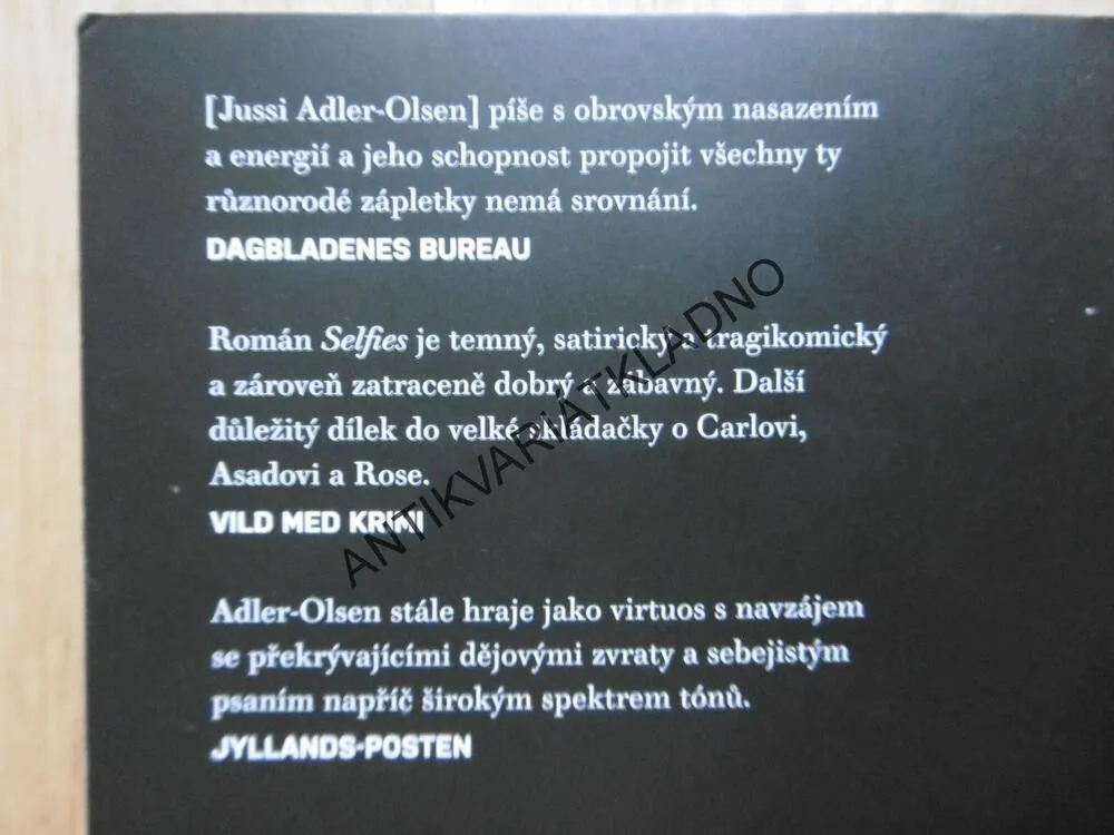 SELFIES, ADLER OLSEN, **an