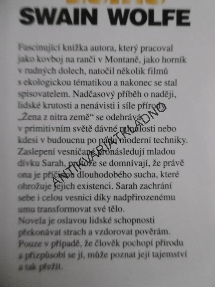 ŽENA Z NITRA ZEMĚ, SWAIN WOLFE, **an
