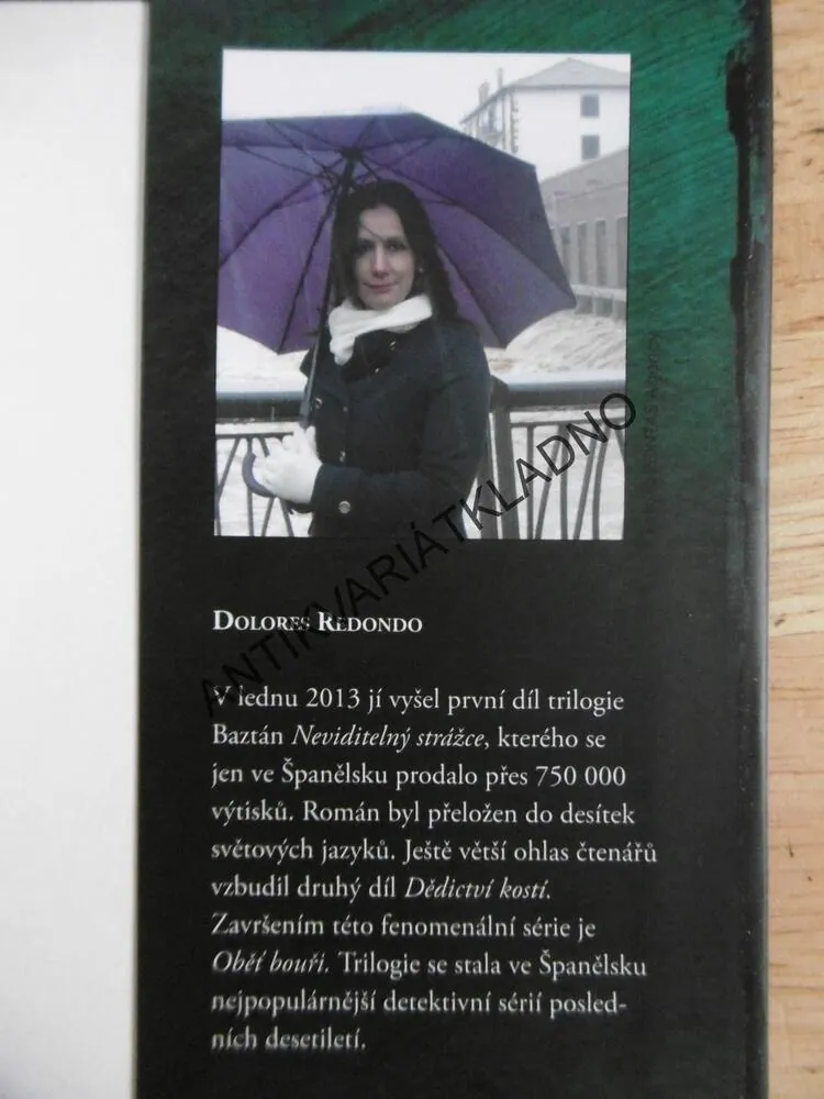 OBĚŤ BOUŘI, DOLORES REDONDO, **an