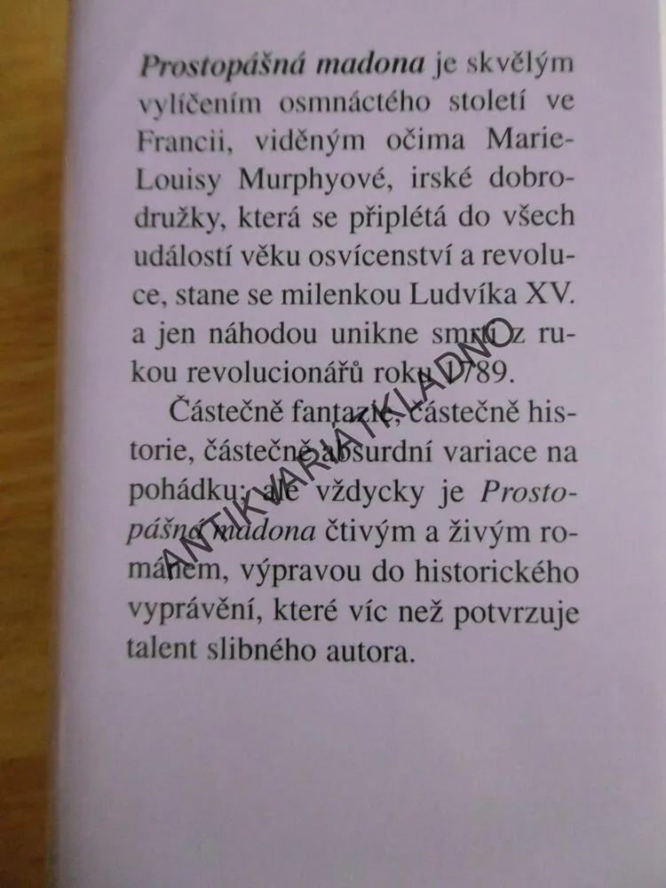 PROSTOPÁŠNÁ MADONA, DUNCAN SPROTT, **an
