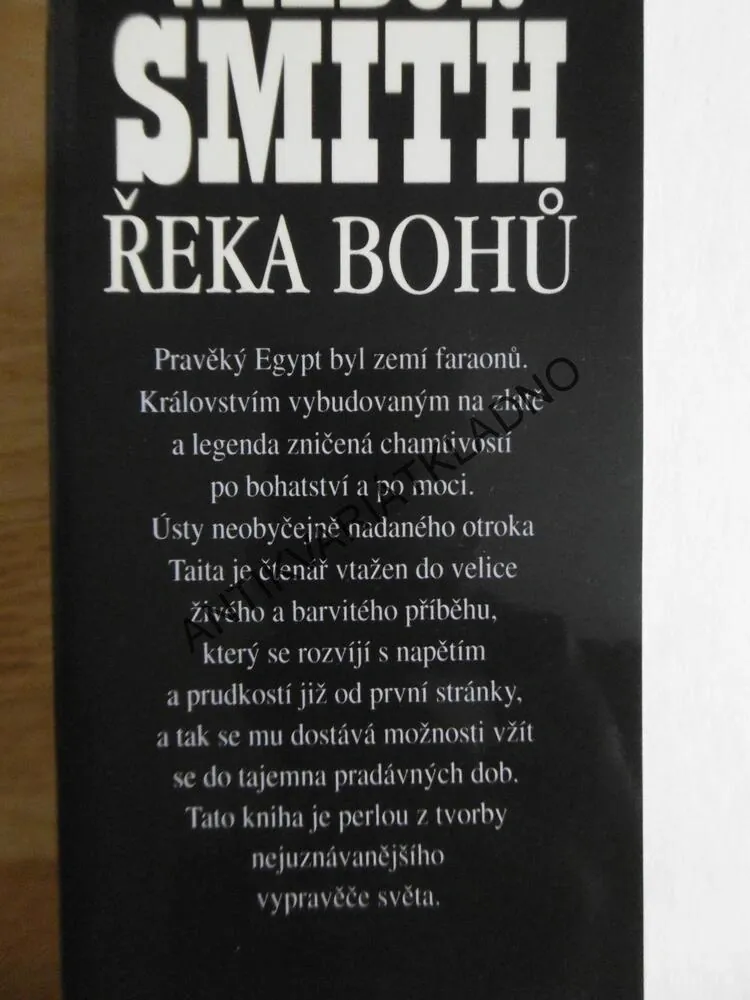 ŘEKA BOHŮ, WILBUR SMITH, **an