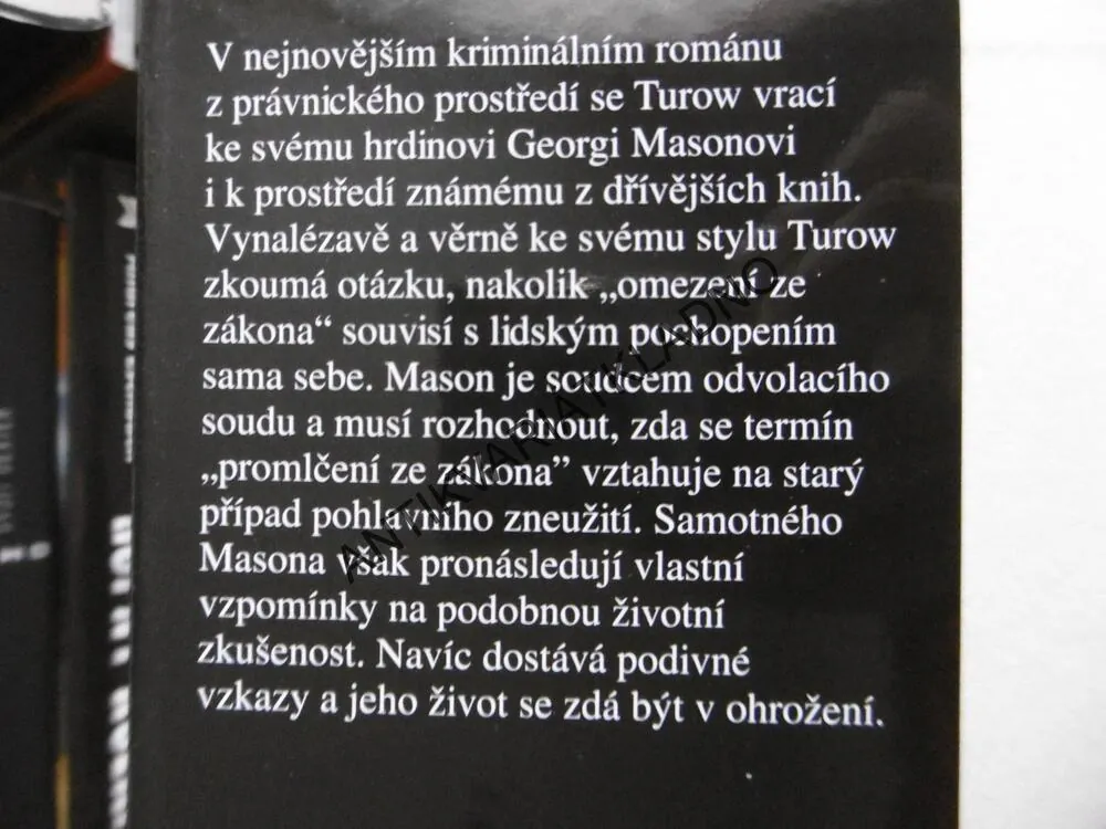 PROMLČENÍ, SCOTT TUROW, **an