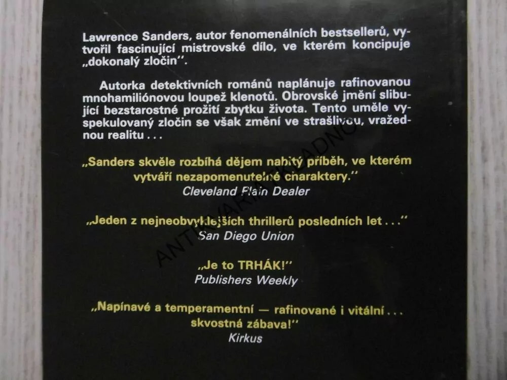 TRHÁK, LAWRENCE SANDERS, **an