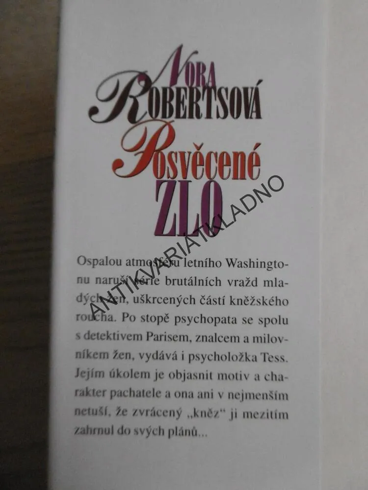 POSVĚCENÉ ZLO, NORA ROBERTSOVÁ, **an