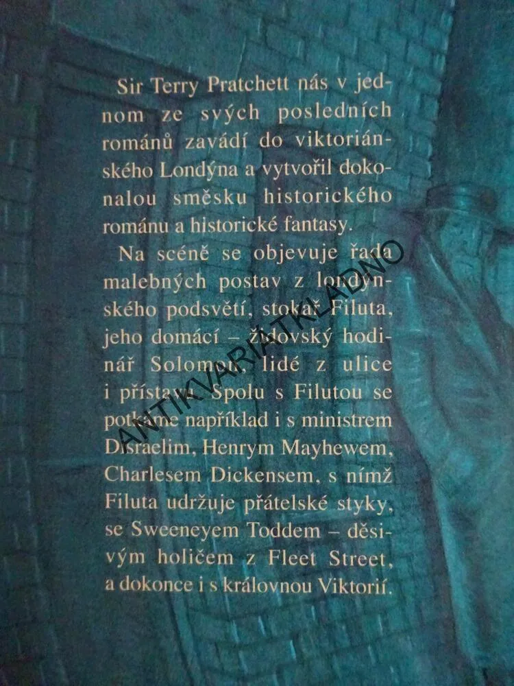 FILUTA, TERRY PRATCHETT, **an