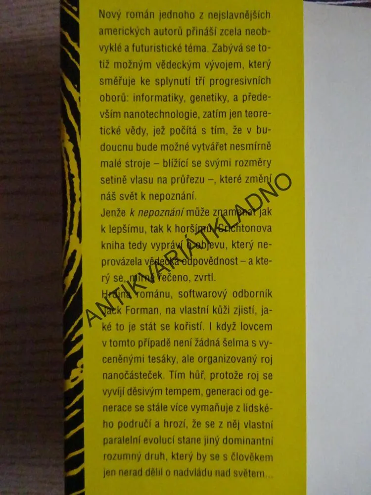 KOŘIST, MICHAEL CRICHTON,  **an