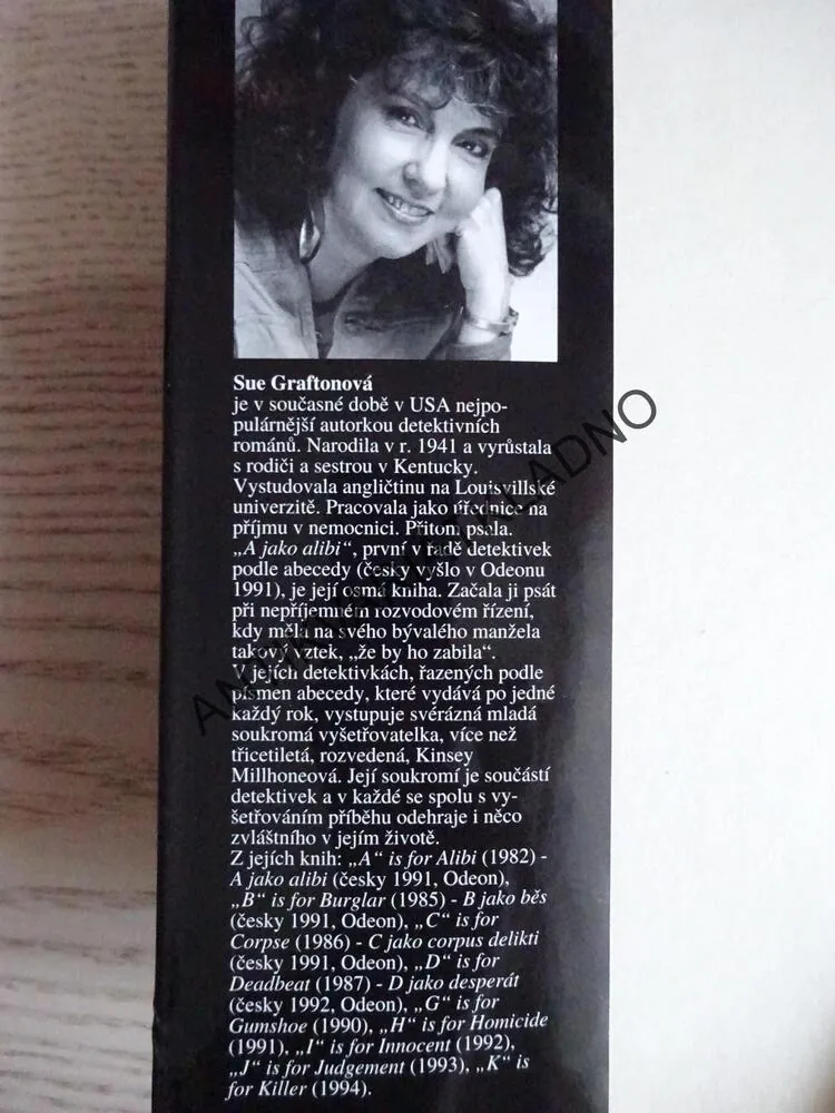 E JAKO EXPLOZE, SUE GRAFTONOVÁ, **an