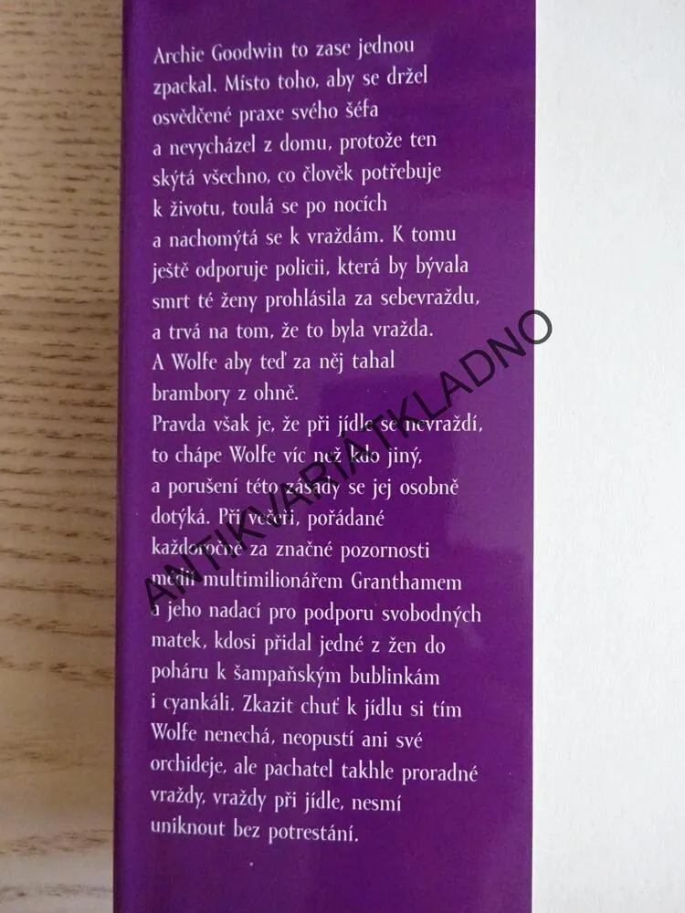 OSUDNÉ ŠAMPAŇSKÉ, REX STOUT, **an