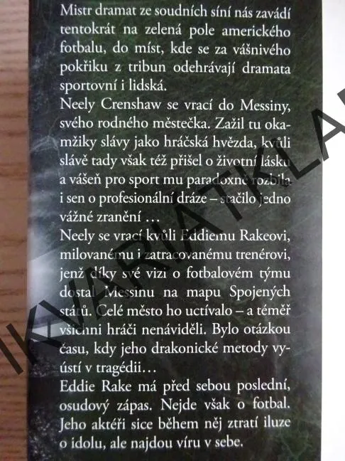TRENÉR, JOHN GRISHAM, **an