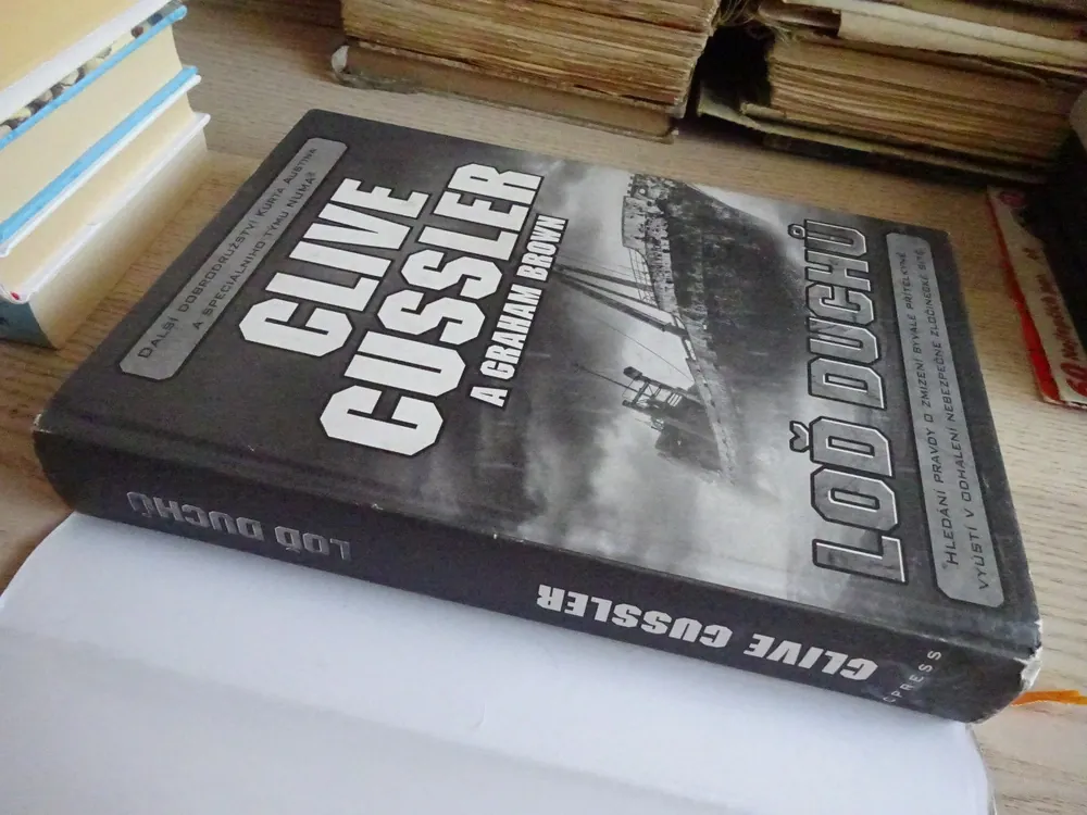 LOĎ DUCHŮ, CLIVE CUSSLER, **an