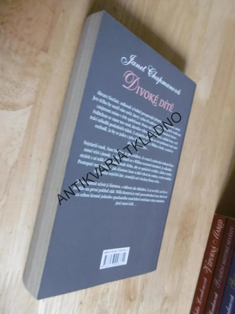DIVOKÉ DÍTĚ, JANET CHAPMANOVÁ, **an