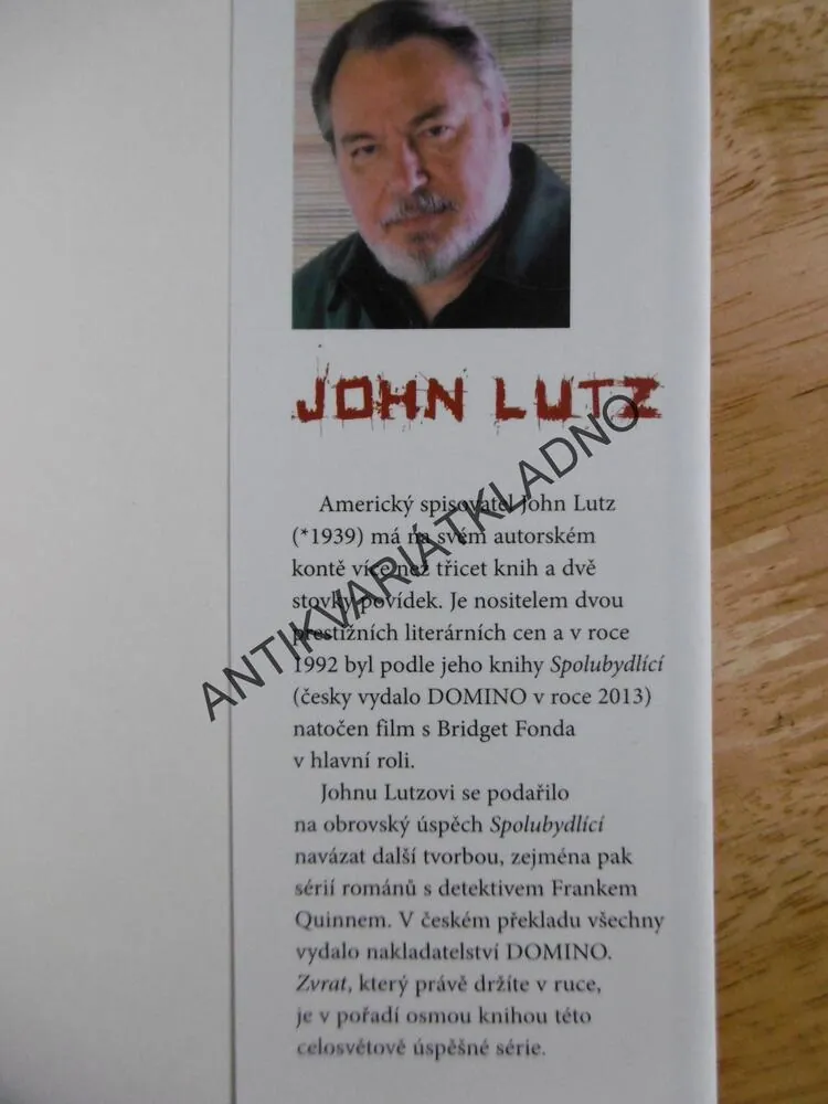 ZVRAT, JOHN LUTZ, **an