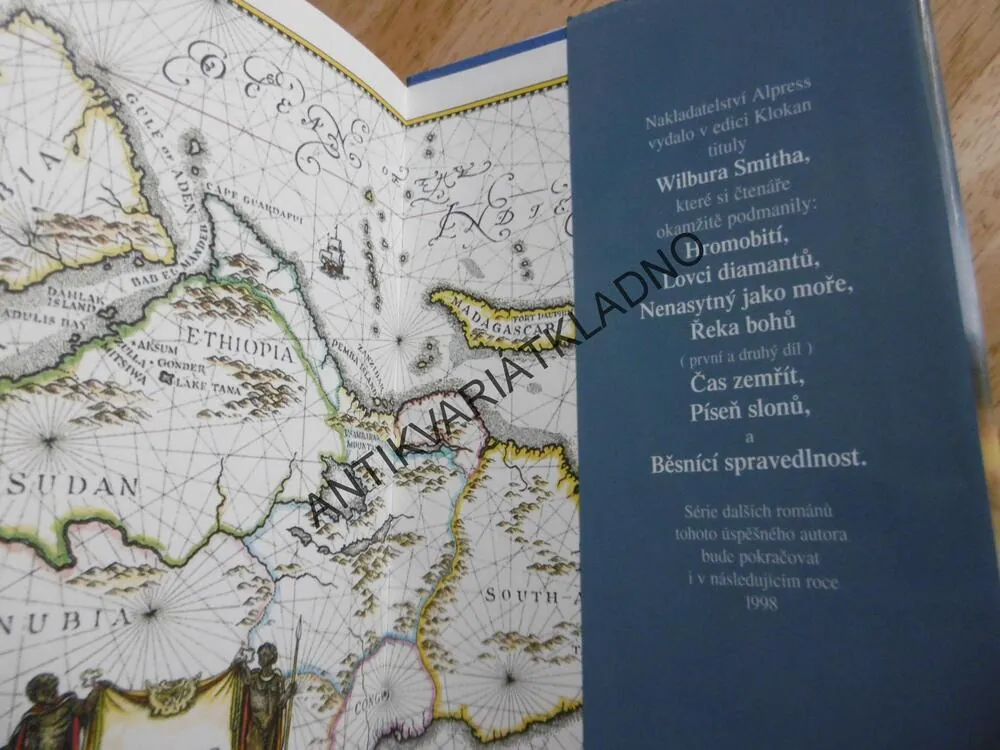 DRAVEC, WILBUR SMITH, **an