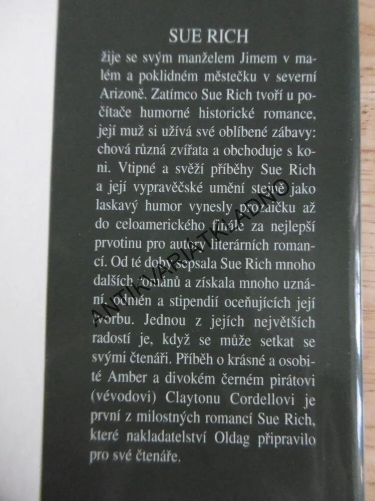 SVŮDNÁ AMBER, SUE RICH, **an