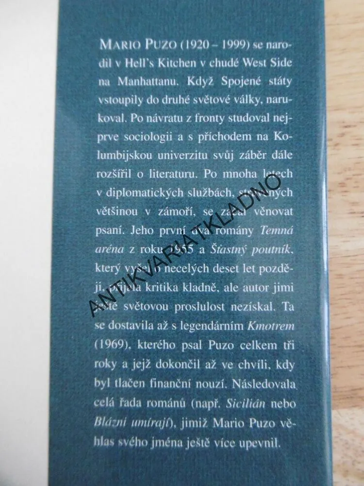 TEMNÁ ARÉNA, MARIO PUZO, **an