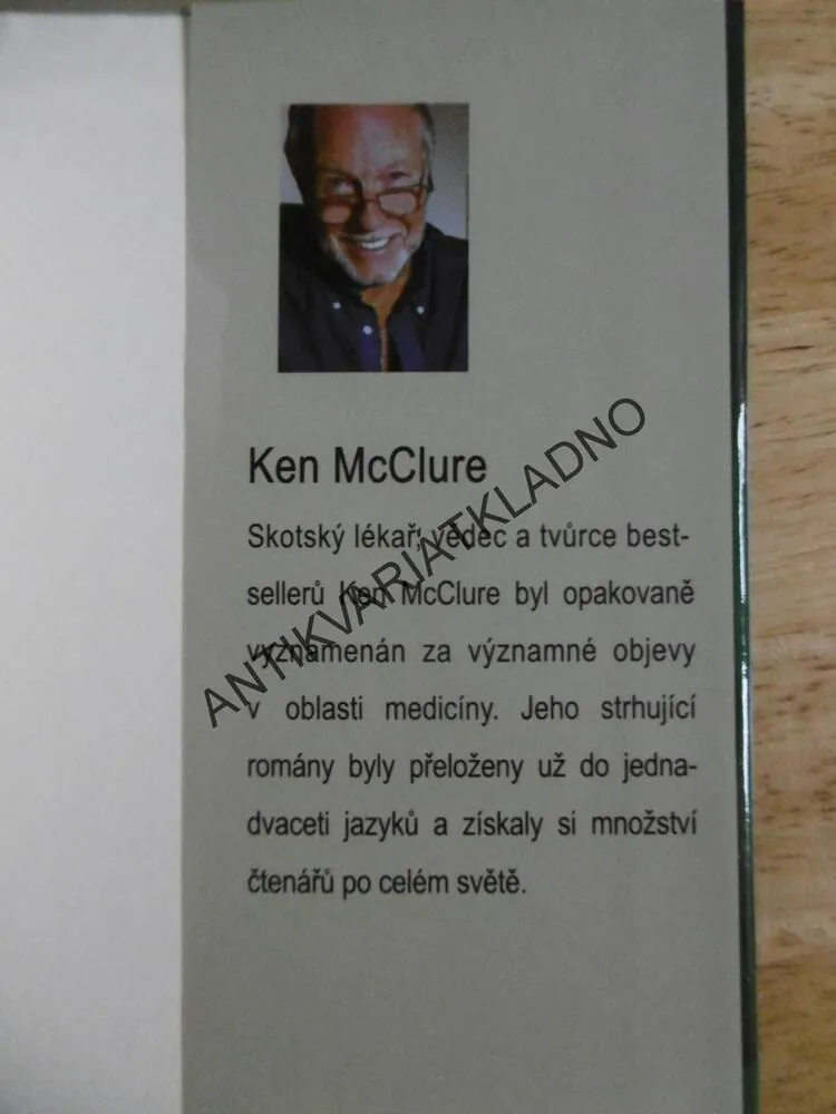 ÚSKOK, KEN MCCLUR, **an