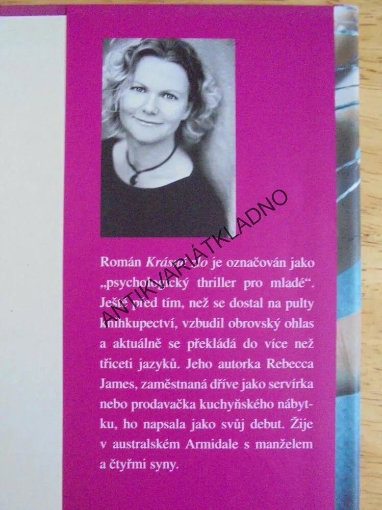 KRÁSNÉ ZLO, REBECCA JAMES, **an