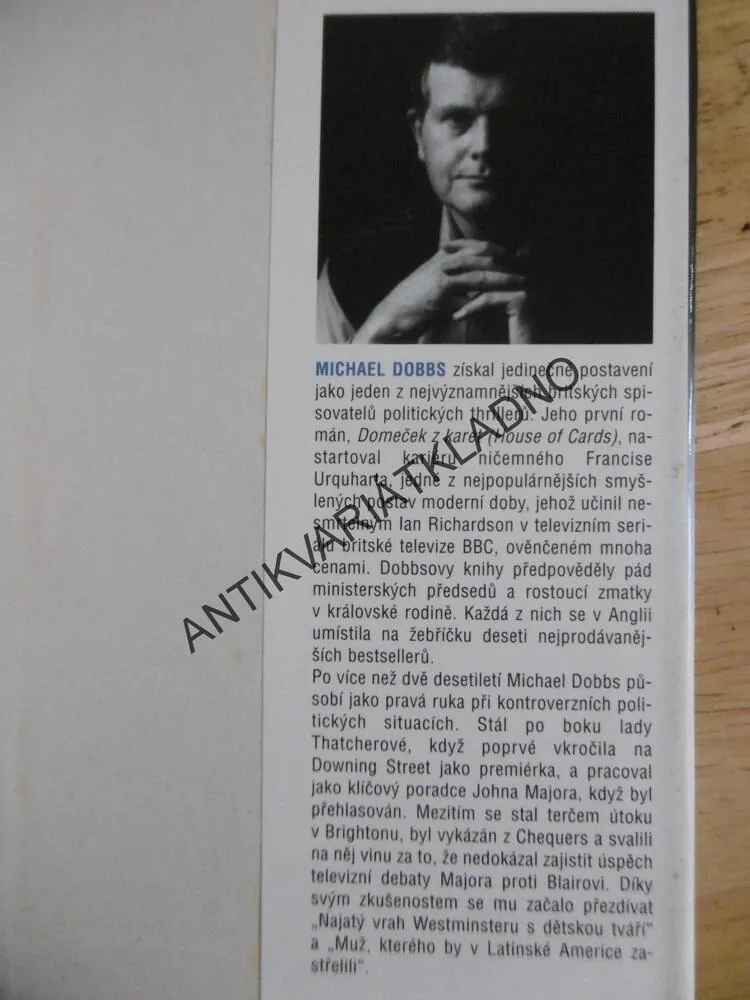 MĚSTO V OBLEŽENÍ, MICHAEL DOBBS, **an