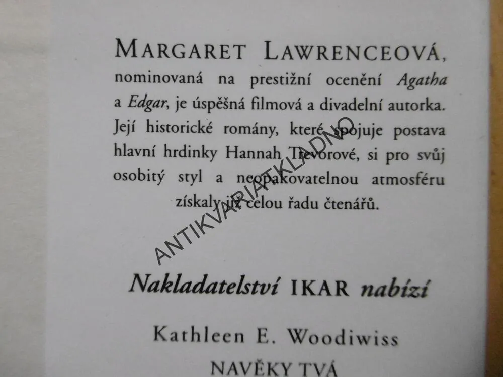 OHEŇ A LED, MARGARET LAWRENCEOVÁ, **an