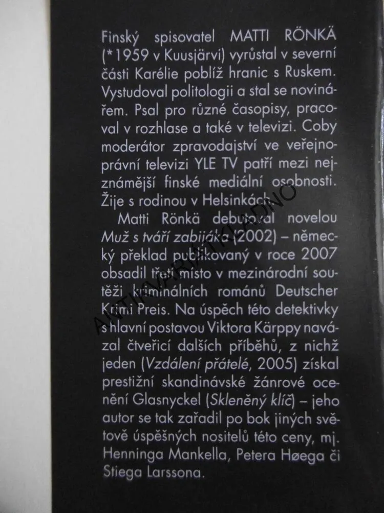MUŽ S TVÁŘÍ ZABIJÁKA, MATTI RÖNKÄ, **an
