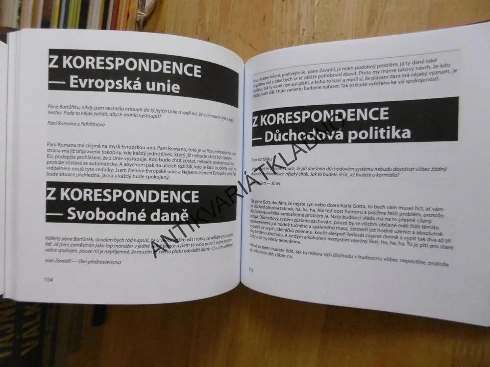 KOMICI S. R. O., **an