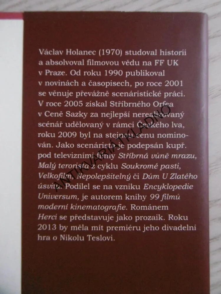 HERCI, VÁCLAV HOLANEC, **an