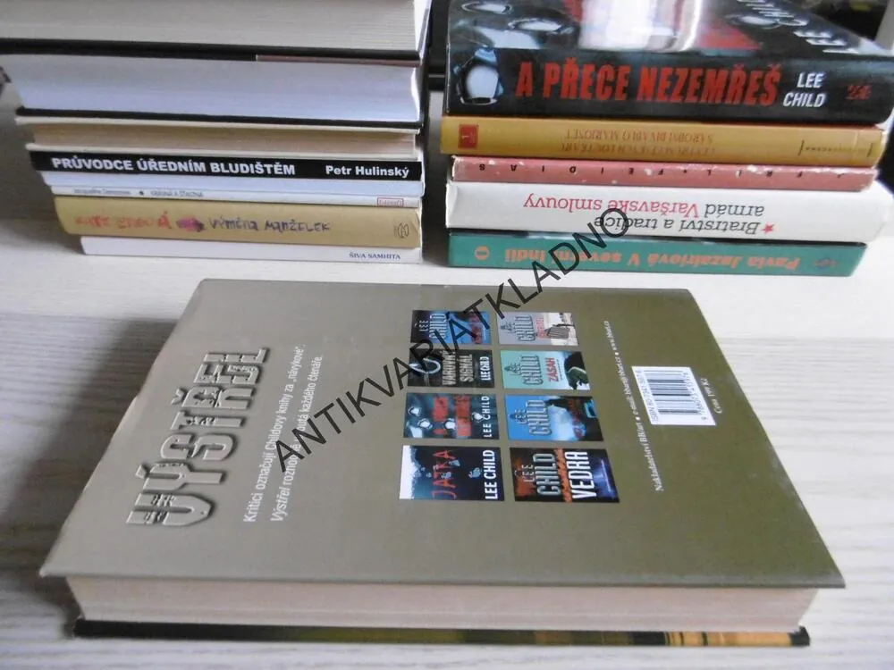 VÝSTŘEL, LEE CHILD, **an