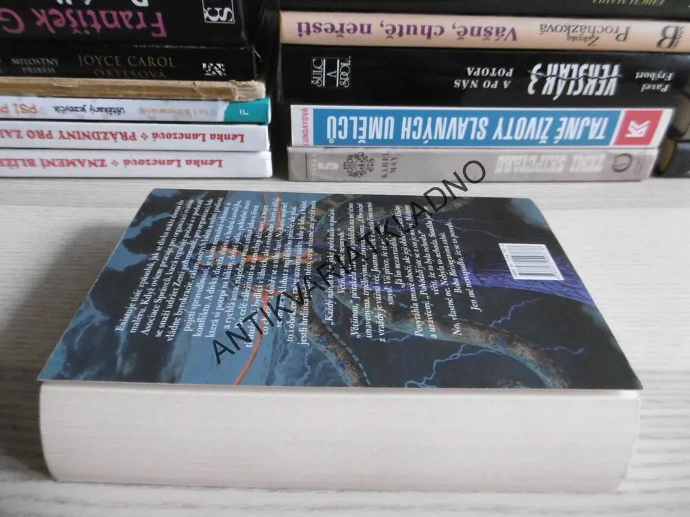 SMOLNÉ POVĚTŘÍ, RACHEL CAINE, **an