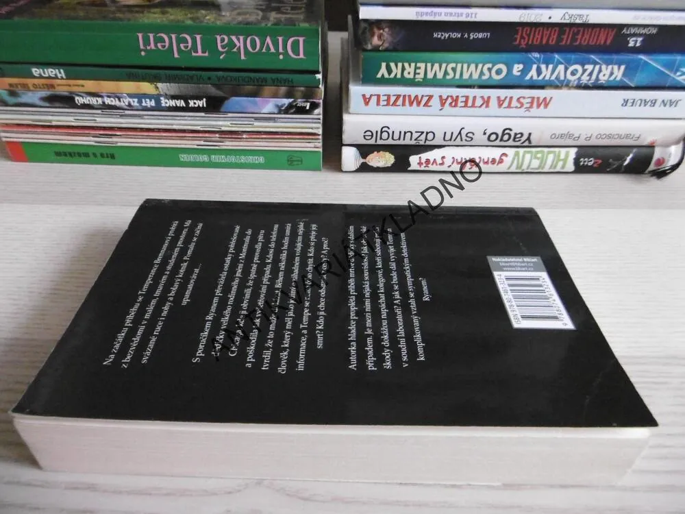 206 KOSTÍ, KATHY REICHS, **an