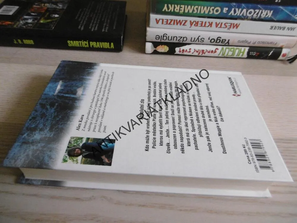 ABSOLUTNÍ ZLO, ALEX KAVA, **an