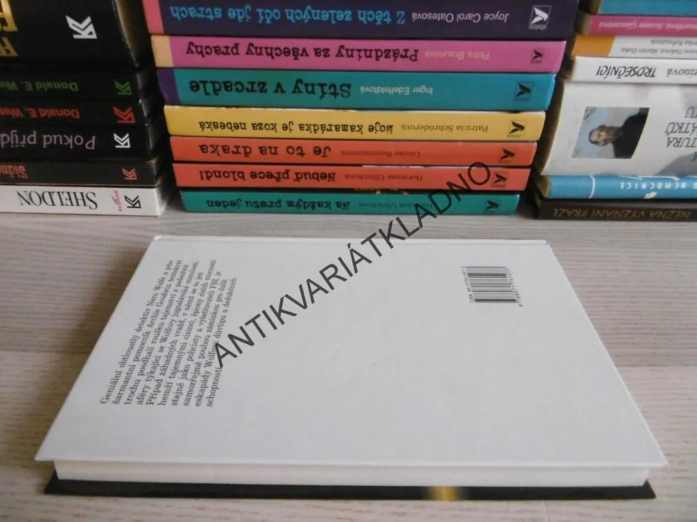 JEN PŘES MOU MRTVOLU, REX STOUT, **an