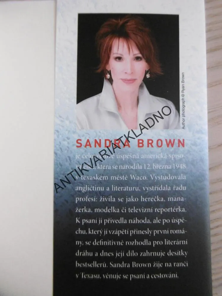 LEST, SANDRA BROWN, **an