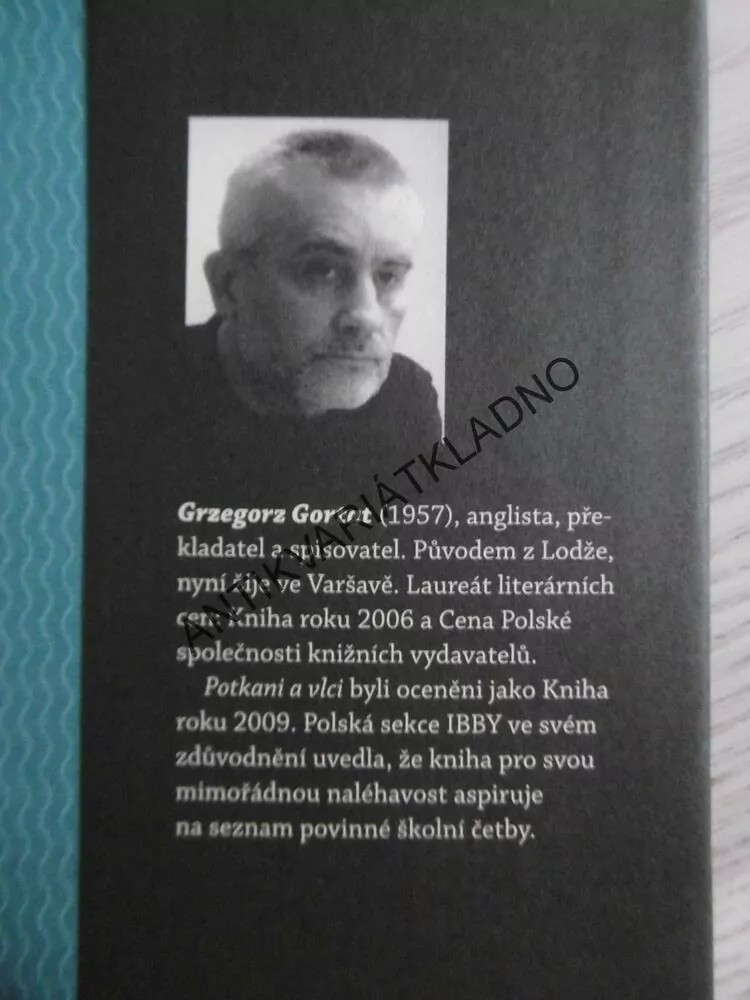 POTKANI A VLCI, GRZEGORZ GORTAT, **an