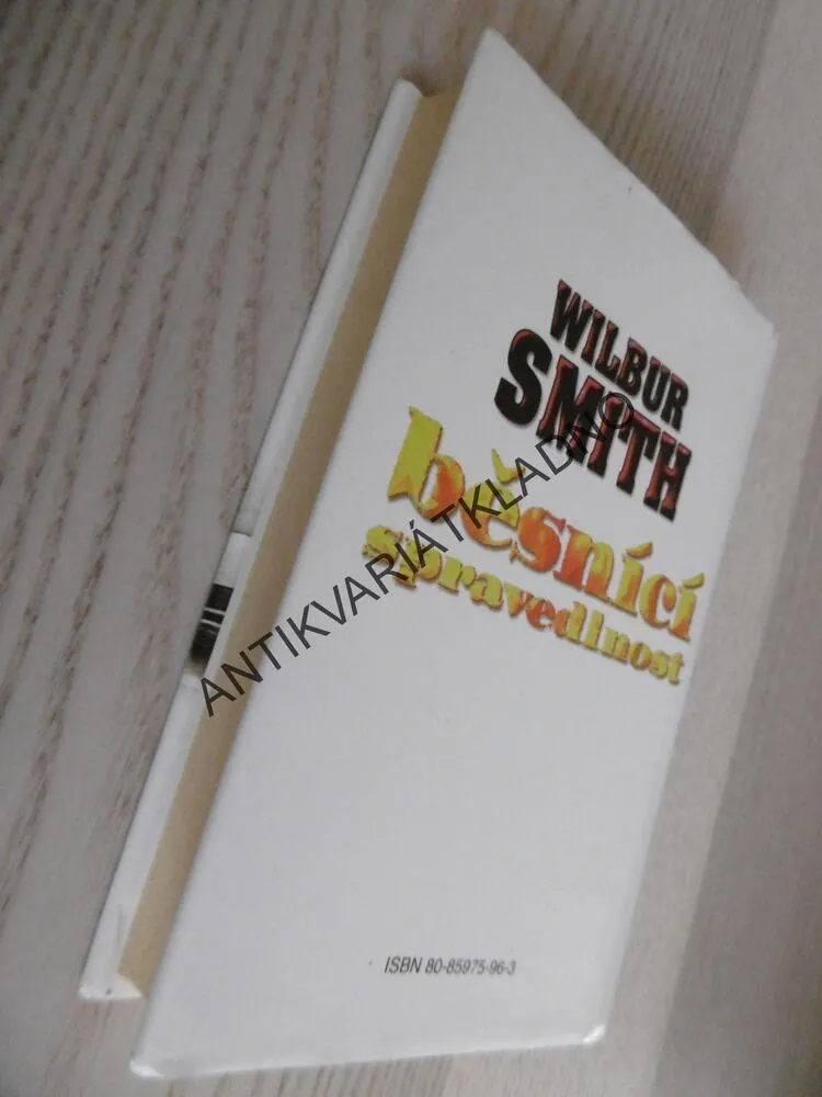 BĚSNÍCI SPRAVEDLNOST, WILBUR SMITH, **an