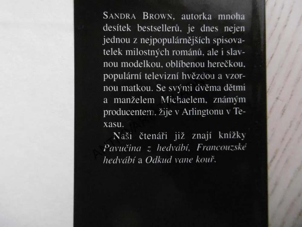 TUČNÉ ÚTERÝ, SANDRA BROWN, **an