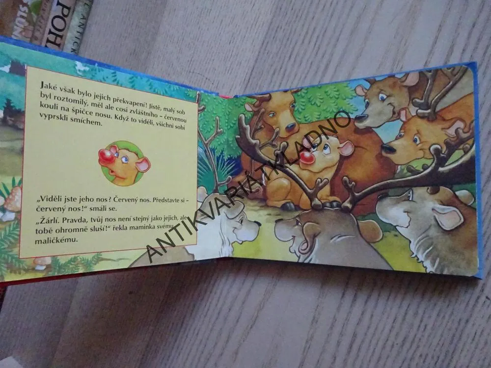 SANTA CLAUSŮV MALÝ SOB S ČERVENÝM NOSEM, **an