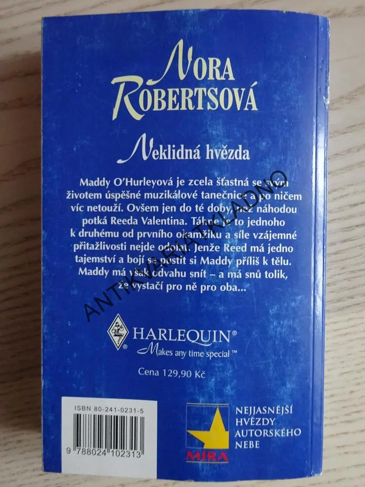 NEKLIDNÁ HVĚZDA, NORA ROBERTSOVÁ, **an