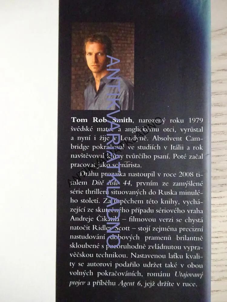 AGENT 6, TOM ROB SMITH, **an