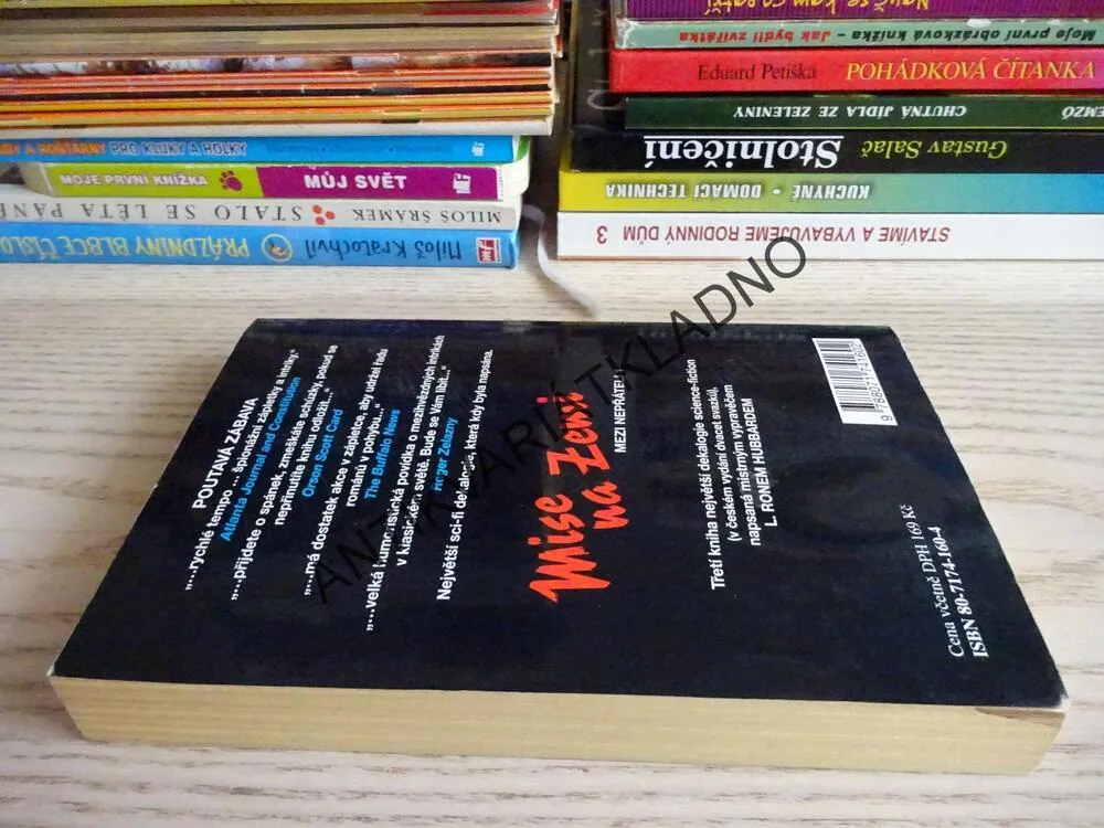 MISE NA ZEMI, L. RON HUBBARD, **an