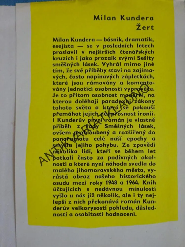 ŽERT, MILAN KUNDERA, **an