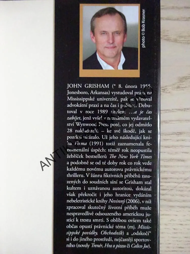 POHLEDÁVKA, JOHN GRISHAM, **an