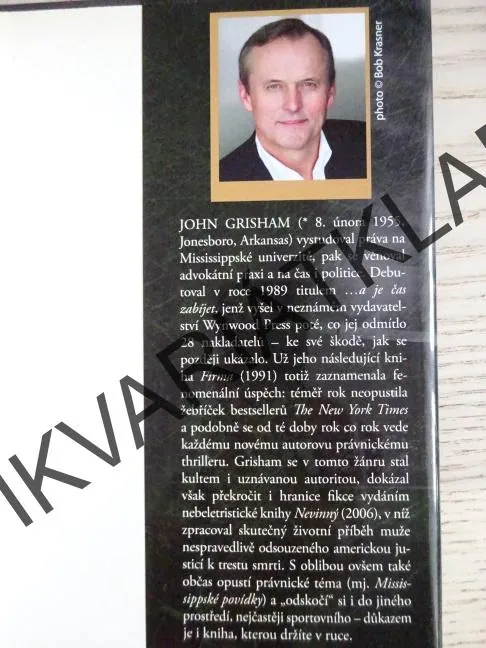 TRENÉR, JOHN GRISHAM, **an