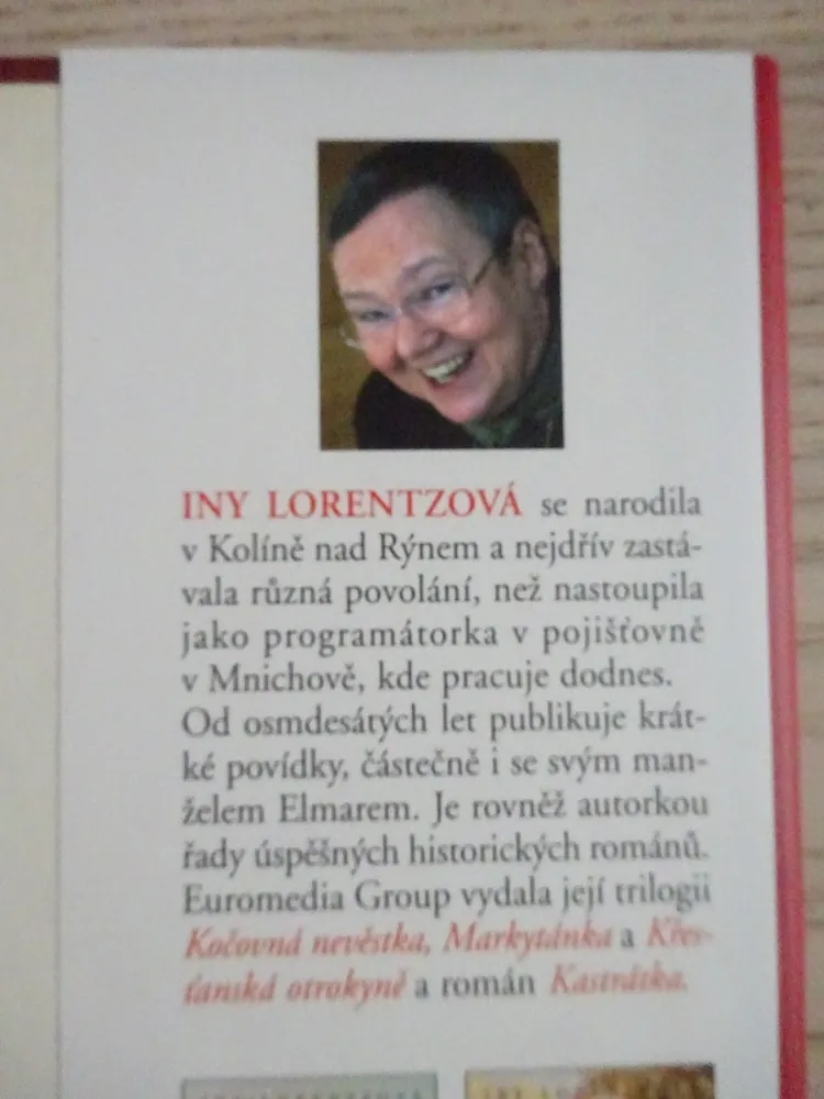 OBCHODNICE SE ZLATEM, INY LORENTZOVÁ, **an