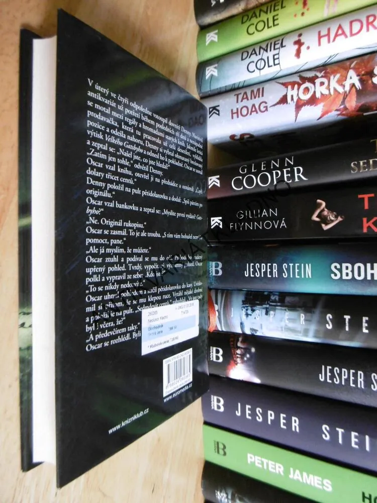 OBCHODNÍK, JOHN GRISHAM, **an