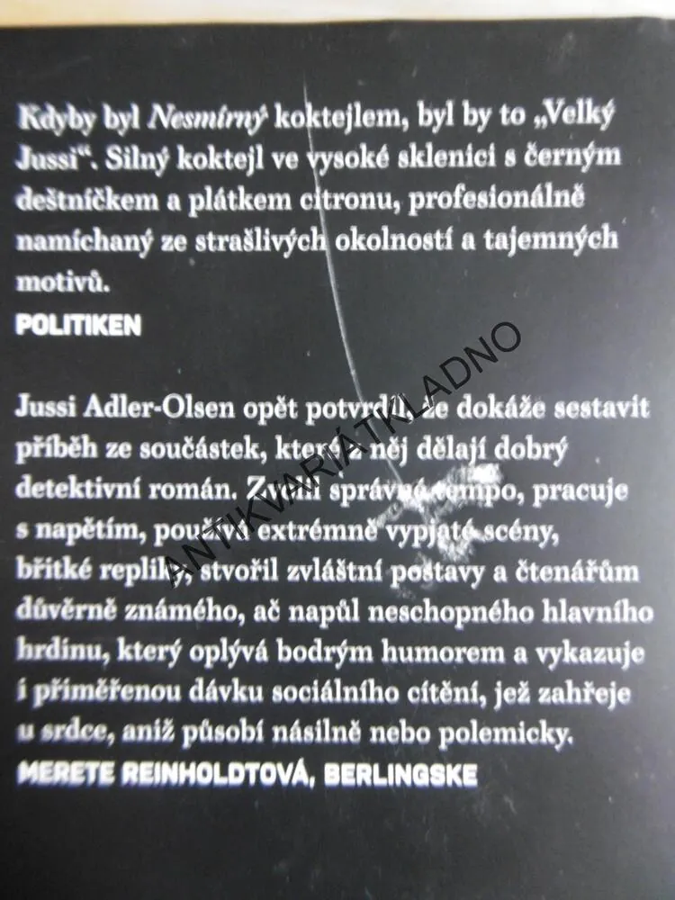 NESMÍRNÝ, ADLER OLSEN, **an