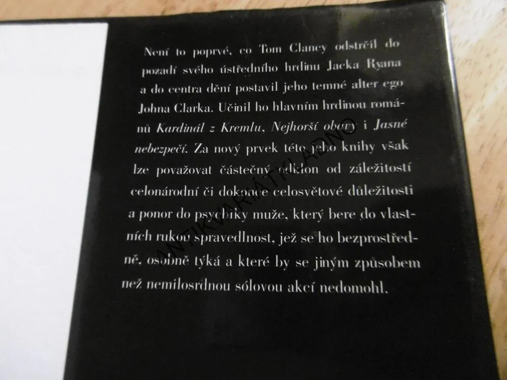 BEZ VÝČITEK, TOM CLANCY, **an